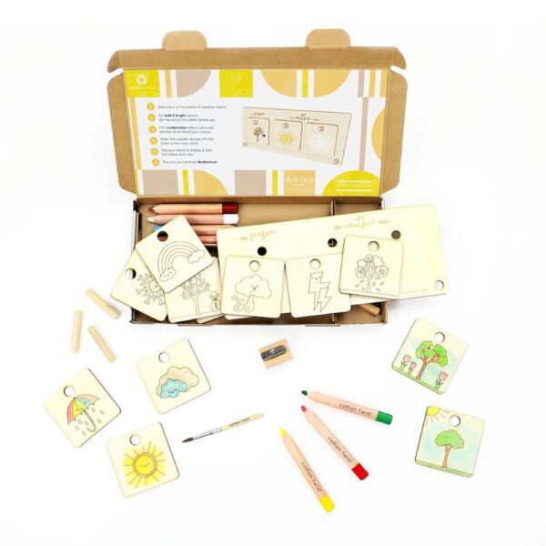 Contents of activity kit to create a colourful wooden weather chart